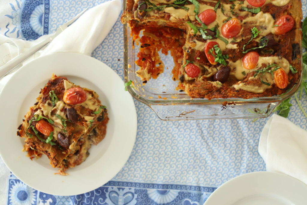 a slice of lasagna removed from the dish