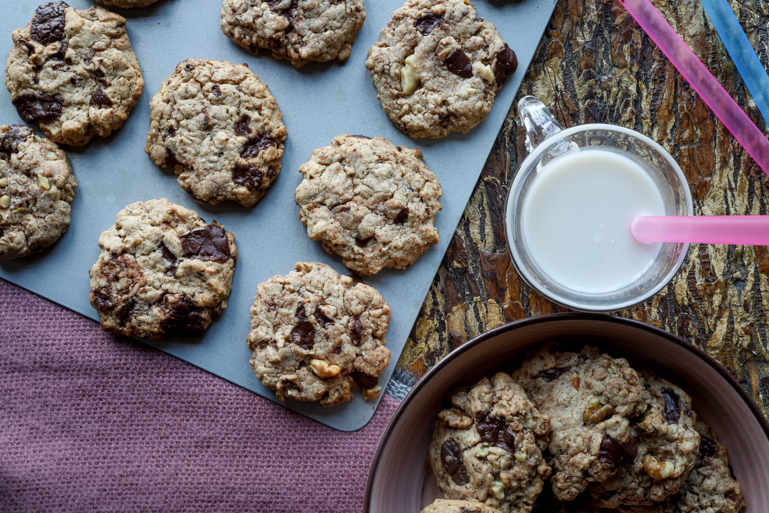 cookies on tray with a glass of milk